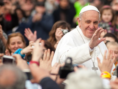 Pope Francis mingling with a crowd in Rome