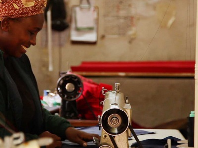 A woman working at a sewing machine
